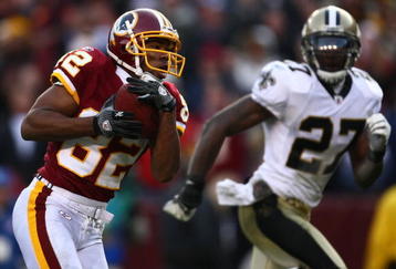 LANDOVER, MD - DECEMBER 06:  Antwaan Randle El #82 of the Washington Redskins makes a break past Malcolm Jenkins #27 of the New Orleans Saints on December 6, 2009 at FedExField in Landover, Maryland.  (Photo by Chris McGrath/Getty Images)