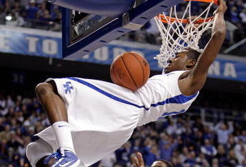LEXINGTON, KY - DECEMBER 05:  John Wall #11 of the Kentucky Wildcats dunks the ball during the game against the North Carolina Tar Heels on December 5, 2009 at Rupp Arena in Lexington, Kentucky. Kentucky won 68-66.  (Photo by Andy Lyons/Getty Images)