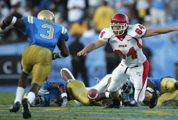 PASADENA, CA - SEPTEMBER 02:  Clint Mower #64 of the Utah Utes dives for a loose ball against the UCLA Bruins during the college football game held on Septemeber 2, 2006 at the Rose Bowl in Pasadena, California. The Bruins defeated the Utes 31-10. The Bruins defeated the Utes 31-10.  (Photo by Jeff Gross/Getty Images)