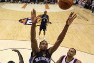 PHOENIX - NOVEMBER 25:  Rudy Gay #22 of the Memphis Grizzlies jumps for a rebound during the NBA game against the Phoenix Suns at US Airways Center on November 25, 2009 in Phoenix, Arizona.  The Suns defeated the Grizzlies 126-111.  NOTE TO USER: User expressly acknowledges and agrees that, by downloading and or using this photograph, User is consenting to the terms and conditions of the Getty Images License Agreement.  (Photo by Christian Petersen/Getty Images)