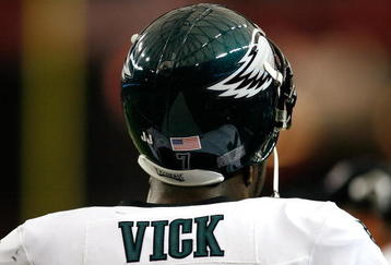 ATLANTA - DECEMBER 06:  Michael Vick #7 of the Philadelphia Eagles looks on from the sidelines during their 34-7 win over the Atlanta Falcons at Georgia Dome on December 6, 2009 in Atlanta, Georgia.  (Photo by Kevin C. Cox/Getty Images)