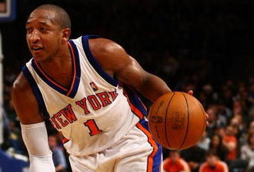 NEW YORK - NOVEMBER 29:  Chris Duhon #1 of the New York Knicks drives to the basket against the Orlando Magic at Madison Square Garden November 29, 2009 in New York City. NOTE TO USER: User expressly acknowledges and agrees that, by downloading and/or using this Photograph, User is consenting to the terms and conditions of the Getty Images License Agreement.  (Photo by Chris McGrath/Getty Images)
