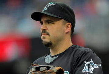 WASHINGTON - AUGUST 06:  First baseman Nick Johnson #20 of the Florida Marlins prepares to take the field against the Washington Nationals at Nationals Park on August 6, 2009 in Washington, DC. The Nationals defeated the Marlins 12-8.  (Photo by Doug Pensinger/Getty Images)