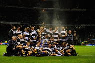 LONDON, ENGLAND - DECEMBER 05:  Players of the Barbarian team celebrate winning the MasterCard Trophy during the MasterCard Trophy match between Barbarians and New Zealand at Twickenham Stadium on December 5, 2009 in London, England.  (Photo by Jamie McDonald/Getty Images)