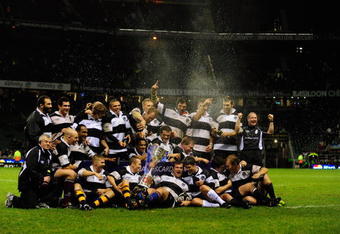 LONDON, ENGLAND - DECEMBER 05:  Players of the Barbarian team celebrate winning the MasterCard Trophy during the MasterCard Trophy match between Barbarians and New Zealand at Twickenham Stadium on December 5, 2009 in London, England.  (Photo by Jamie McDonald/Getty Images)