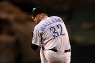 ANAHEIM, CA - MAY 6:  Roy Halladay #32 of the Toronto Blue Jays throws a pitch against the Los Angeles Angels of Anaheim at Angel Stadium May 6, 2009 in Anaheim, California.  (Photo by Stephen Dunn/Getty Images)