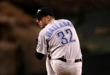ANAHEIM, CA - MAY 6:  Roy Halladay #32 of the Toronto Blue Jays throws a pitch against the Los Angeles Angels of Anaheim at Angel Stadium May 6, 2009 in Anaheim, California.  (Photo by Stephen Dunn/Getty Images)