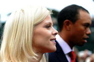 SAN FRANCISCO - OCTOBER 07:  Elin Woods and husband Tiger Woods exit during Opening Ceremony of The Presidents Cup at Harding Park Golf Course on October 7, 2009 in San Francisco, California.  (Photo by Harry How/Getty Images)