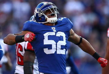 EAST RUTHERFORD, NJ - NOVEMBER 22: Michael Boley #52 of the the New York Giants celebrates after sacking quarterback Matt Ryan #2 of the Atlanta Falcons on November 22, 2009 at Giants Stadium in East Rutherford, New Jersey.  (Photo by Chris McGrath/Getty Images)