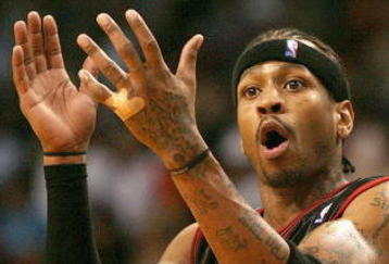 MIAMI - APRIL 14:  Allen Iverson #3 of the Philadelphia 76ers argues a call with official Derrick Collins #54 against the Miami Heat at American Airlines Arena on April 14, 2006 in Miami, Florida. The Heat defeated the 76ers 104-85. NOTE TO USER: User expressly acknowledges and agrees that, by downloading and/or using this Photograph, user is consenting to the terms and conditions of the Getty Images License Agreement. (Photo by Doug Benc/Getty Images)