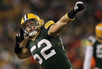 GREEN BAY, WI - DECEMBER 7:  Clay Matthews #52 of the Green Bay Packers celebrates after he sacked Joe Flacco #5 of the Baltimore Ravens in the first half at Lambeau Field on December 7, 2009 in Green Bay, Wisconsin.  (Photo by Jonathan Daniel/Getty Images)