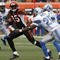 CINCINNATI, OH - DECEMBER 6: Chad Ochocinco #85 of the Cincinnati Bengals fights to break free from Marvin White #25 of the Detroit Lions in their NFL game at Paul Brown Stadium December 6, 2009 in Cincinnati, Ohio.    (Photo by John Sommers II/Getty Images)