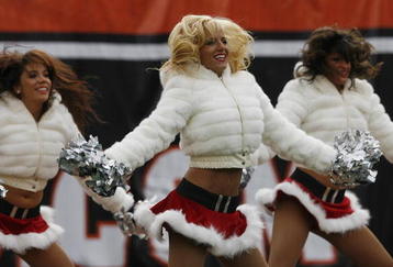 CINCINNATI, OH - DECEMBER 6: Cheerleaders for the Cincinnati Bengals cheers for their team against the Detroit Lions in their NFL game at Paul Brown Stadium December 6, 2009 in Cincinnati, Ohio.    (Photo by John Sommers II/Getty Images)