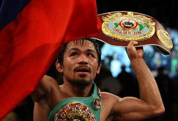 LAS VEGAS - NOVEMBER 14:  Manny Pacquiao celebrates his 12 round TKO victory against Miguel Cotto during their WBO welterweight title fight at the MGM Grand Garden Arena on November 14, 2009 in Las Vegas, Nevada.  (Photo by Al Bello/Getty Images)