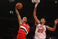 NEW YORK - DECEMBER 07: Jerryd Bayless #4 of the Portland Trail Blazers drives to the basket against Jared Jeffries #20 of the New York Knicks at Madison Square Garden on December 7, 2009 in New York, New York. NOTE TO USER: User expressly acknowledges and agrees that, by downloading and/or using this Photograph, user is consenting to the terms and conditions of the Getty Images License Agreement. (Photo by Nick Laham/Getty Images)