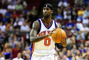 ORLANDO, FL - DECEMBER 02:  Larry Hughes #0 of the New York Knicks sets up a play during the game against the Orlando Magic at Amway Arena on December 2, 2009 in Orlando, Florida.  NOTE TO USER: User expressly acknowledges and agrees that, by downloading and/or using this Photograph, user is consenting to the terms and conditions of the Getty Images License Agreement.  (Photo by Sam Greenwood/Getty Images)