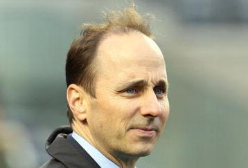 NEW YORK - OCTOBER 16:  General Manager Brian Cashman of the New York Yankees looks on during batting practice before his team plays the Los Angeles Angels of Anaheim in Game One of the ALCS during the 2009 MLB Playoffs on October 16, 2009 at Yankee Stadium in the Bronx borough of New York City.  (Photo by Jim McIsaac/Getty Images)