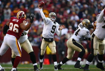LANDOVER, MD - DECEMBER 06:  Quarterback Drew Brees #9 of the New Orleans Saints throws a pass against the Washington Redskins on December 6, 2009 at FedExField in Landover, Maryland.  (Photo by Chris McGrath/Getty Images)