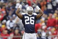 KANSAS CITY, MO - OCTOBER 11: Ken Hamlin #26 of the Dallas Cowboys jumps up during the NFL game against the Kansas City Chiefs at Arrowhead Stadiumin on October 11, 2009 Kansas City, Missouri. The Cowboys defeated the Chiefs 26-20 in overtime. (Photo by Jamie Squire/Getty Images)