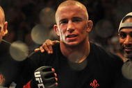 LAS VEGAS - JULY 11:  Georges St. Pierre celebrates his victory against Thiago Alves during their welterweight title bout during UFC 100 on July 11, 2009 in Las Vegas, Nevada. St. Pierre defeated Alves by unanimous decision.  (Photo by Jon Kopaloff/Getty Images)