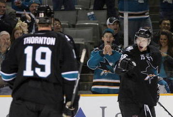 SAN JOSE, CA - DECEMBER 03:  Dany Heatley #15 of the San Jose Sharks celebrates after scoring a goal in the first period of their game against the St. Louis Blues at HP Pavilion on December 3, 2009 in San Jose, California.  (Photo by Ezra Shaw/Getty Images)