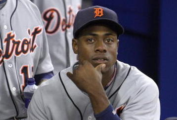 TORONTO - APRIL 6: Curtis Granderson #28 of the Detroit Tigers looks on from the dugout during the Opening Day game against the Toronto Blue Jays at the Rogers Centre April 6, 2009 in Toronto, Ontario. (Photo by: Dave Sandford/Getty Images)