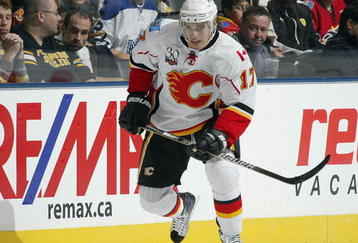 TORONTO, ON - NOVEMBER 14:  Rene Bourque #17 of the Calgary Flames skates after the puck in a game against the Toronto Maple Leafs on November 14,2009 at the Air Canada Centre in Toronto, Ontario. The Flames won 5-2. (Photo by Claus Andersen/Getty Images) 