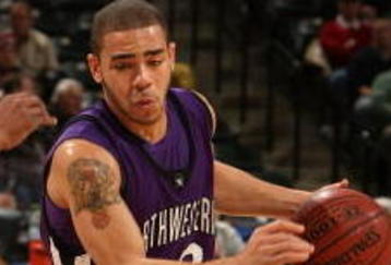 INDIANAPOLIS - MARCH 12:  Michael Thompson #22 of the Northwestern Wildcats drives against the Minnesota Golden Gophers during the first round of the Big Ten Men's Basketball Tournament at Conseco Fieldhouse on March 12, 2009 in Indianapolis, Indiana.  (Photo by Jonathan Daniel/Getty Images)
