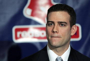 BOSTON - DECEMBER 14:  Red Sox general manager Theo Epstein pauses before he addresses the media during a press conference announcing that the pitcher Daisuke Matsuzaka has signed with the Boston Red Sox on December 14, 2006 at Fenway Park in Boston, Massachusetts. Matsuzaka will earn $52 million over six years.  (Photo by Elsa/Getty Images)