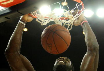 OAKLAND, CA - NOVEMBER 20:  Greg Oden #52 of the Portland Trail Blazers dunks against the Golden State Warriors during an NBA game at Oracle Arena on November 20, 2009 in Oakland, California.  (Photo by Jed Jacobsohn/Getty Images)