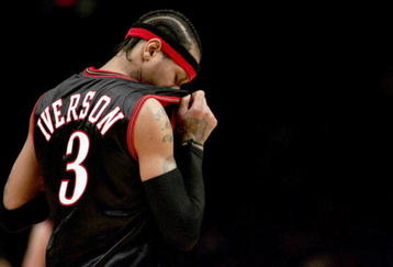 NEW YORK - NOVEMBER 26: Allen Iverson #3 of the Philadelphia 76ers wipes sweat from his face against the New York Knicks on November 26, 2005 at Madison Square Garden in New York City. The Knicks defeated the 76ers in overtime 105-102. NOTE TO USER: User expressly acknowledges and agrees that, by downloading and/or using this Photograph, user is consenting to the terms and conditions of the Getty Images License Agreement.  (Photo by Nick Laham/Getty Images) 