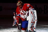 MONTREAL- JANUARY 15:  Jaroslav Halak #41 of the Montreal Canadiens kneels during pre-game ceremonies prior to facing the Nashville Predators on January 15, 2009 at the Bell Centre in Montreal, Quebec, Canada. The Canadiens defeated the Predators 3-2.   (Photo by Richard Wolowicz/Getty Images)