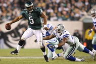 PHILADELPHIA - NOVEMBER 08: Donovan McNabb #5 of the Philadelphia Eagles attempts to avoid the pass rush Victor Butler #57 of the Dallas Cowboys at Lincoln Financial Field on November 8, 2009 in Philadelphia, Pennsylvania. McNabb was sacked on the play. The Cowboys won 20-16. (Photo by Al Bello/Getty Images)