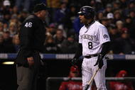 DENVER - OCTOBER 12:  Yorvit Torrealba #8 of the Colorado Rockies argues a called third strike with home plate umpire Ron Kulpa #46 against the Philadelphia Phillies in the seventh inning in Game Four of the NLDS during the 2009 MLB Playoffs at Coors Field on October 12, 2009 in Denver, Colorado. (Photo by Jed Jacobsohn/Getty Images)