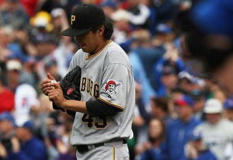 CHICAGO - MAY 27: Jesse Chavez #43 of the Pittsburgh Pirates reacts after giving up a home run to Reed Johnson of the Chicago Cubs on May 27, 2009 at Wrigley Field in Chicago, Illinois. The Cubs defeated the Pirates 5-2. (Photo by Jonathan Daniel/Getty Images) 
