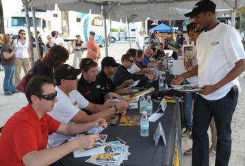 MIAMI BEACH, FL - NOVEMBER 18: Kyle Busch, Ron Hornaday Jr., Karl Edwards and other drivers and fans attend the NASCAR and Nationwide Fan Event at Lummus park on November 18, 2009 in Miami Beach, Florida.  (Photo by Marc Serota/Getty Images)