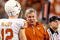 ARLINGTON, TX - DECEMBER 05:  Head coach Mack Brown of the Texas Longhorns talks with Colt McCoy #12 at Cowboys Stadium on December 5, 2009 in Arlington, Texas.  (Photo by Ronald Martinez/Getty Images)