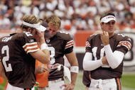 CLEVELAND - SEPTEMBER 28: Offensive coordinator Bruce Arians of the Cleveland Browns talks to quarterbacks Tim Couch #2, Nate Hybl #8, and Kelly Holcomb #10 during a game against the Cincinnati Bengals at Cleveland Browns Stadium on September 28, 2003 in Cleveland, Ohio. The Bengals defeated the Browns 21-14. (Photo by Phil Long/Getty Images)