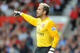 MANCHESTER, UNITED KINGDOM - AUGUST 29:   Manuel Almunia of Arsenal gestures during the Barclays Premier League match between Manchester United and Arsenal at Old Trafford on August 29, 2009 in Manchester, England. (Photo by Laurence Griffiths/Getty Images)