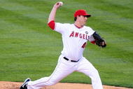 ANAHEIM, CA - OCTOBER 22:  Starting pitcher John Lackey #41 of the Los Angeles Angels of Anaheim pitches in the first inning against the New York Yankees in Game Five of the ALCS during the 2009 MLB Playoffs at Angel Stadium on October 22, 2009 in Anaheim, California.  (Photo by Jacob de Golish/Getty Images)