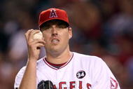 ANAHEIM, CA - OCTOBER 22:  John Lackey #41 of the Los Angeles Angels of Anaheim reacts in Game Five of the ALCS against the New York Yankees during the 2009 MLB Playoffs at Angel Stadium on October 22, 2009 in Anaheim, California.  (Photo by Stephen Dunn/Getty Images)