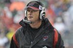 TAMPA, FL - NOVEMBER 30:  Coach Jon Gruden of the Tampa Bay Buccaneers checks the scoreboard against the New Orleans Saints at Raymond James Stadium on November 30, 2008 in Tampa, Florida.  (Photo by Al Messerschmidt/Getty Images)