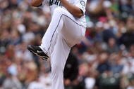SEATTLE - APRIL 19:  Carlos Silva #52 of the Seattle Mariners pitches against the Detroit Tigers during the game on April 19, 2009 at Safeco Field in Seattle, Washington. (Photo by Otto Greule Jr/Getty Images)