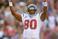 ORCHARD PARK, NY - NOVEMBER 01: Andre Johnson #80 of the Houston Texans reacts to Ryan Moats #21 (not shown) touchdown run against the Buffalo Bills at Ralph Wilson Stadium on November 1, 2009 in Orchard Park, New York. Houston won 31-10. (Photo by Rick Stewart/Getty Images)