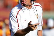 LOS ANGELES, CA - NOVEMBER 14:  Head Coach Pete Carroll of the USC Trojans questions a non-fumble call in the game against the Stanford Cardinal during the second half at the Los Angeles Memorial Coliseum on November 14, 2009 in Los Angeles, California.  Stanford won 55-21.  (Photo by Harry How/Getty Images)