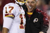 LANDOVER, MD - OCTOBER 26: Head coach Jim Zorn of the Washington Redskins jokes around with quarterback Jason Campbell #17 during warm ups before the game against the Philadelphia Eagles at FedEx Field October 26, 2009 in Landover, Maryland. (Photo by Win McNamee/Getty Images)