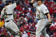 ST. LOUIS - APRIL 06:  :  :  Matt Capps #55 and Ryan Doumit #41 of the Pittsburgh Pirates celebrate the win over the St. Louis Cardinals on Opening Day on April 6, 2009  at Busch Stadium in St. Louis, Missouri. The Pittsburgh Pirates defeated the St. Louis Cardinals 6-4.  (Photo by Elsa/Getty Images)
