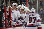 NEWARK, NJ - SEPTEMBER 16: Matt Gilroy #97 of the New York Rangers scores against Yann Danis #35 of the New Jersey Devils during the shoot out at the Prudential Center on September 16, 2009 in Newark, New Jersey. The Devils defeated the Rangers 3-2 in the shoot out. (Photo by Bruce Bennett/Getty Images)