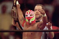 SAN DIEGO - JULY 12:  New cruiserweight champion Rey Mysterio Jr acknowledges the crowd after defeating Jericho during the WWE Bash at the Beach event at Cox Arena in San Diego, California on July 12, 1998.  (Photo by Elsa /Getty Images) 