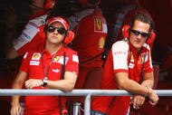 ABU DHABI, UNITED ARAB EMIRATES - OCTOBER 30: Former Ferrari F1 World Champion Michael Schmumacher (R) of Germany talks with Felipe Massa (L) of Brazil and Ferrari on the pitwall during practice for the Abu Dhabi Formula One Grand Prix at the Yas Marina Circuit on October 30, 2009 in Abu Dhabi, United Arab Emirates. (Photo by Paul Gilham/Getty Images)